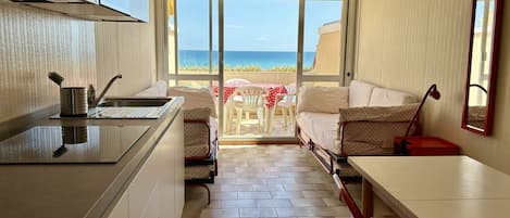 Fridge, oven, dishwasher, dining tables