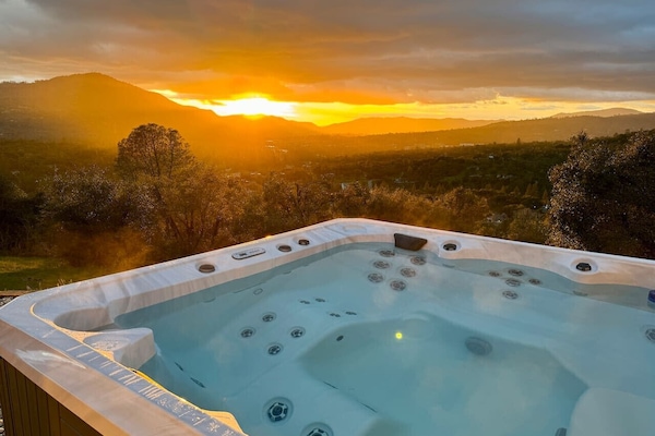 Hot tub with breathtaking mountain sunset view