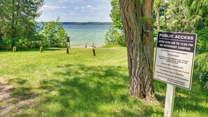 A public access sign with rules for a park area, including operating hours and restrictions. - Alden Home w/ Fire Pit: Steps to Torch Lake! (Alden)