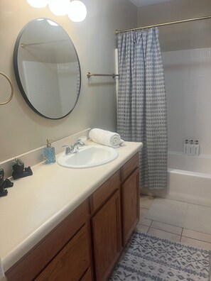 Hair dryer, towels, soap, shampoo