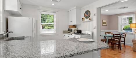 Fridge, microwave, coffee/tea maker, toaster