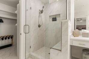 Shower, hair dryer, towels