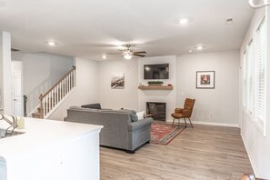 Smart TV, fireplace, books