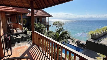 Deluxe Double Room, Beach View | Terrace/patio