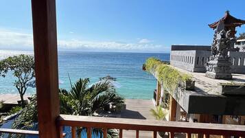 Kamar Double Deluks, pemandangan pantai | Teras/patio