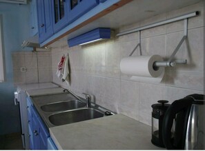 Fridge, oven, coffee/tea maker, toaster