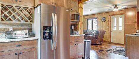 Fridge, microwave, stovetop, coffee/tea maker