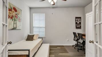 4 bedrooms, desk, iron/ironing board, travel cot