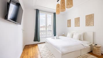 2 habitaciones, tabla de planchar con plancha, cuna de viaje y wifi
