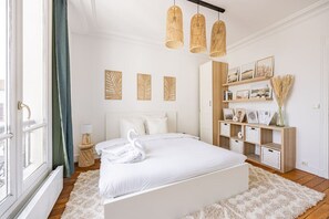 2 habitaciones, tabla de planchar con plancha, cuna de viaje y wifi 