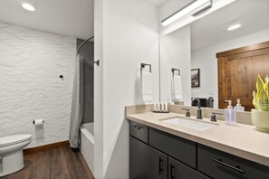 Hair dryer, towels, soap, shampoo