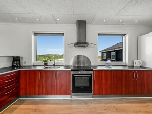 Fridge, microwave, dishwasher, cookware/dishes/utensils