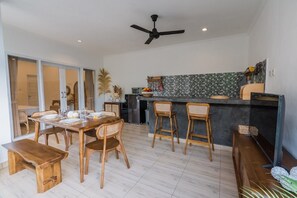 Villa Leya | Living room | 55-inch flat-screen TV with satellite channels - Villa Leya & Leon Canggu - Private 3BR Villa with Pool (Canggu)