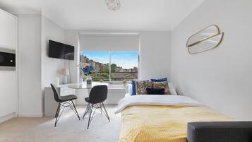 1 dormitorio, tabla de planchar con plancha, wifi gratis y ropa de cama