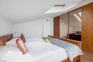 2 bedrooms, desk, iron/ironing board, travel cot