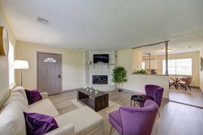 Indoor fireplace with patio and pool table
