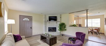 Indoor fireplace with patio and pool table