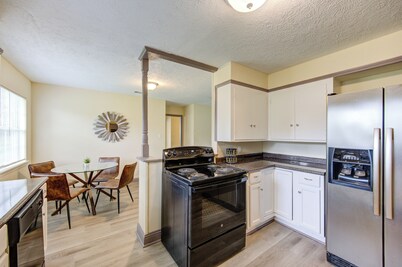 Indoor fireplace with patio and pool table
