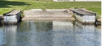 2 houses, 2 boat slips boat ramp,