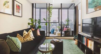 Serene botanical oasis with city views and sunroom