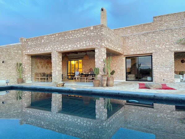 Outdoor pool, pool umbrellas, pool loungers