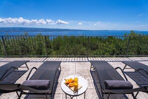 Outdoor dining - Seaview Villa Roko with heated pool (Jesenice, Dugi Rat)
