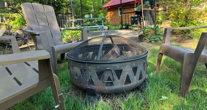 A stylish Adirondack Log Cabin located along side the NYS Hiking trail System!!