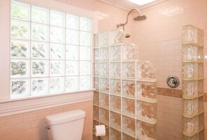 Shower, hair dryer, towels, toilet paper