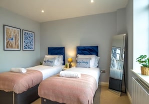 2 chambres, fer et planche Ă repasser, draps fournis
