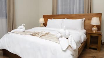 Desk, laptop workspace, free WiFi, bed sheets