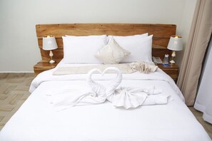 Desk, laptop workspace, free WiFi, bed sheets