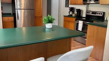 Coffee/tea maker, fridge, microwave, oven