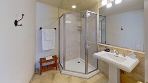 Shower, hair dryer, towels, soap