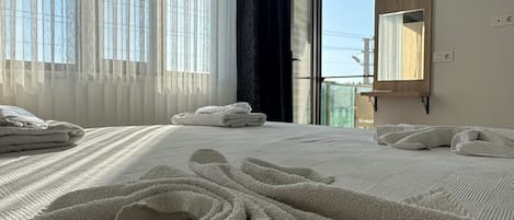 Family Room, Courtyard View | Egyptian cotton sheets, premium bedding, down comforters, desk