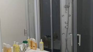 Shower, jetted tub, hair dryer, bidet