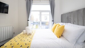 2 chambres, fer et planche à repasser, Wi-Fi, draps fournis
