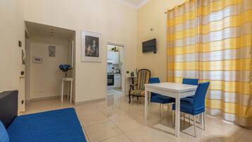 Apartment | Living area | 35-inch TV with digital channels