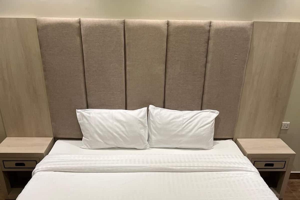 2 bedrooms, blackout curtains, soundproofing, iron/ironing board