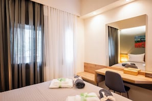 1 chambre, coffres-forts dans les chambres, fer et planche à repasser