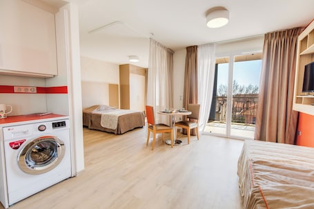Family Studio, Balcony | 1 bedroom, blackout drapes, iron/ironing board, free WiFi