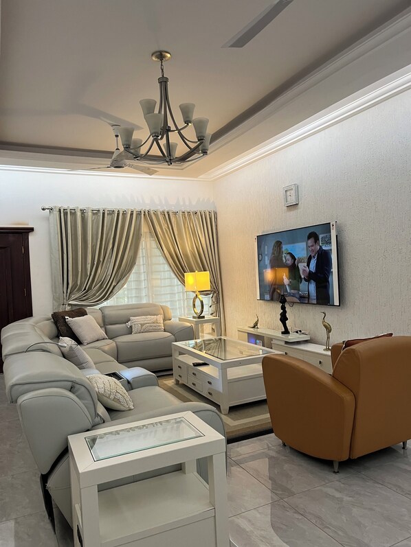 Smart TV, table football, books, computer monitors