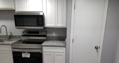 Enjoy the 2 Bedroom Basement Apartment with Kitchen and a Full Bathroom