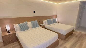 Standard Double Room, 2 Double Beds, Non Smoking, Ground Floor | In-room safe, desk, laptop workspace, free WiFi