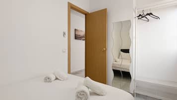 2 dormitorios, tabla de planchar con plancha, wifi gratis y ropa de cama