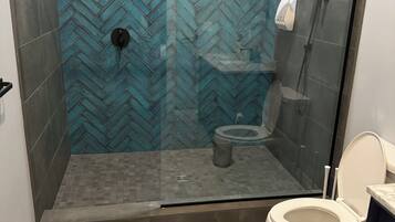 Shower, hair dryer, towels, soap