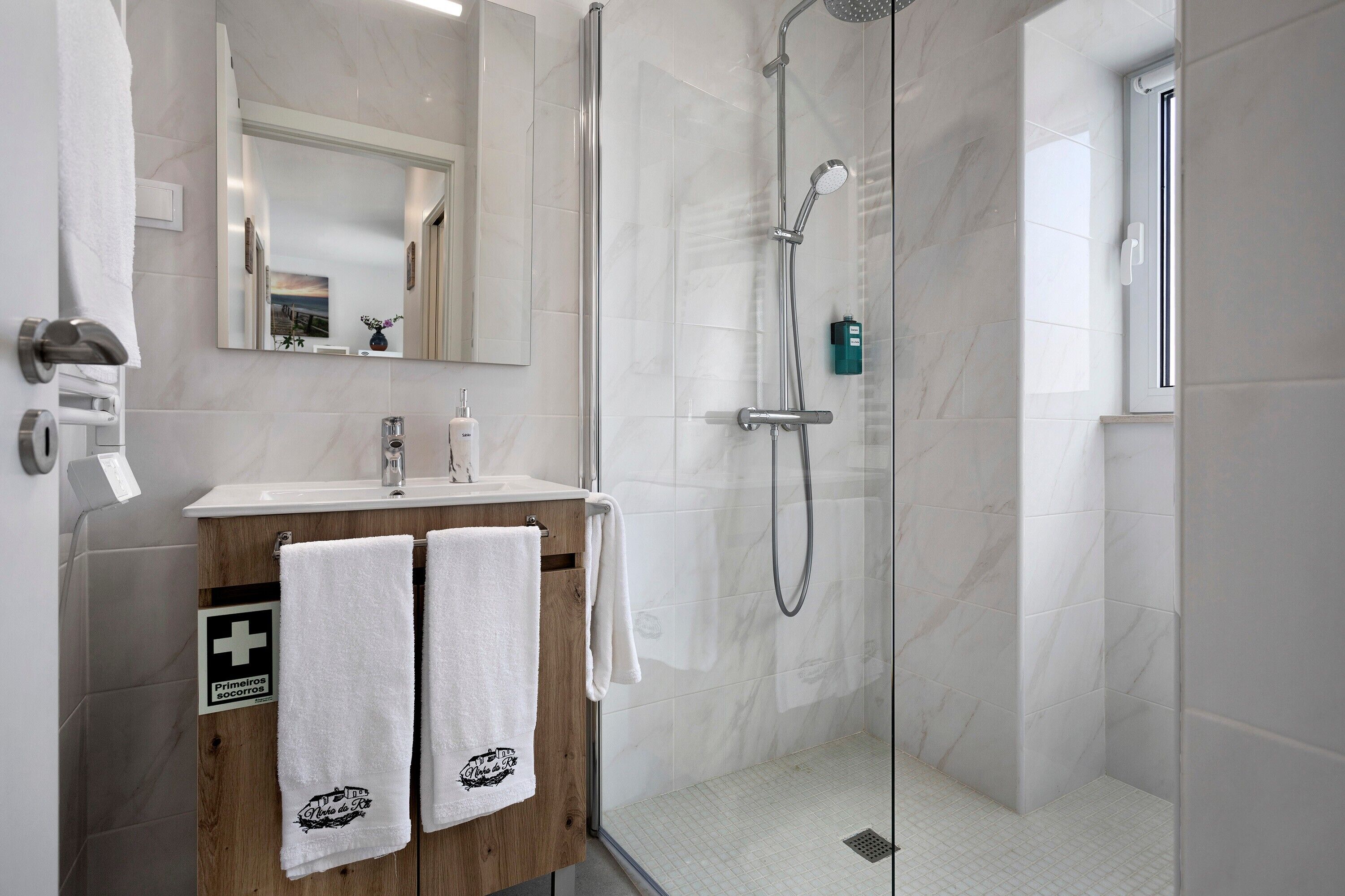 Shower, hair dryer, towels