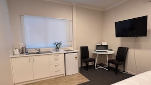 Habitación Elite doble | Tabla de planchar con plancha, wifi gratis, ropa de cama