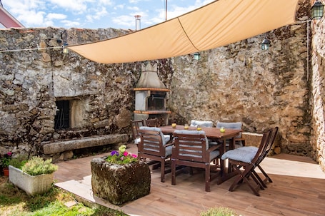 Outdoor dining. Country House 'El Corral De La Antigua' with Mountain View, Private Terrace and Wi-Fi