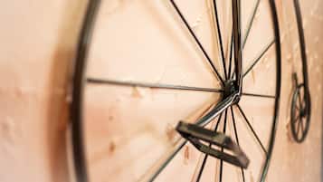 A close-up of a bicycle wheel with spokes and a hub.