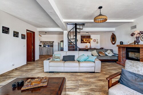Holiday home 'Casa Girassol' with shared pool, private terrace, and Wi-Fi access